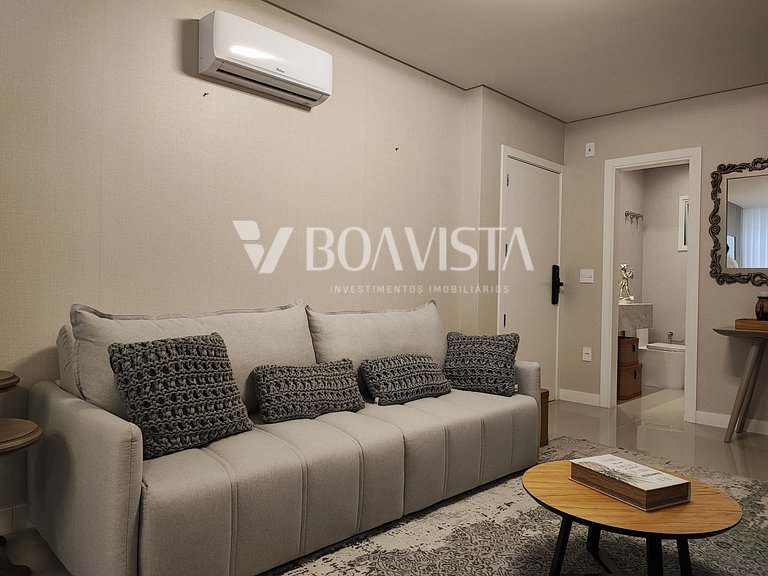 Apartamento novo mobiliado com 2 suites na Av. principal de