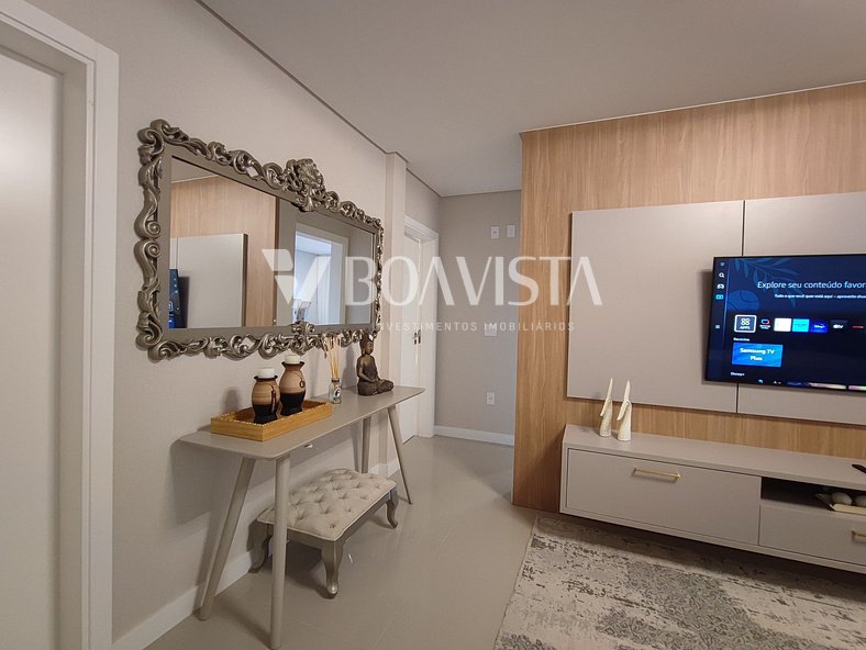 Apartamento novo mobiliado com 2 suites na Av. principal de