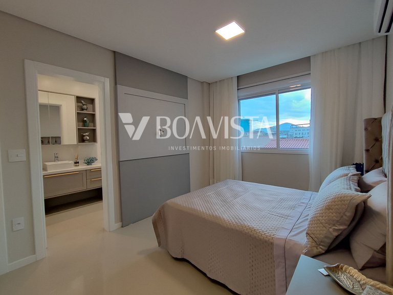 Apartamento novo mobiliado com 2 suites na Av. principal de